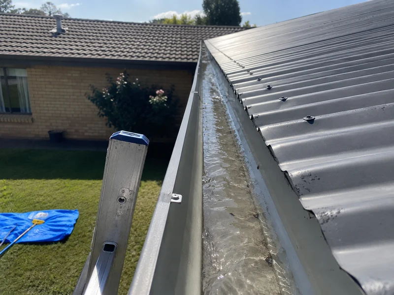 Clean gutter run after clearing